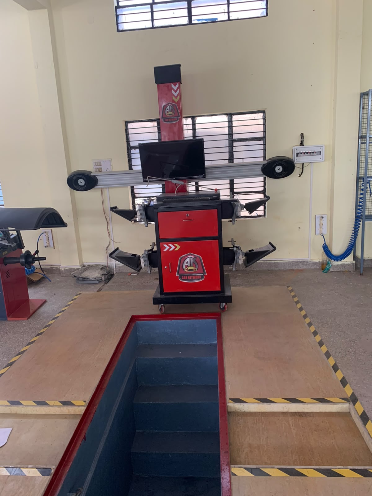 Wheel Alignment work at AK Car Network Bengaluru